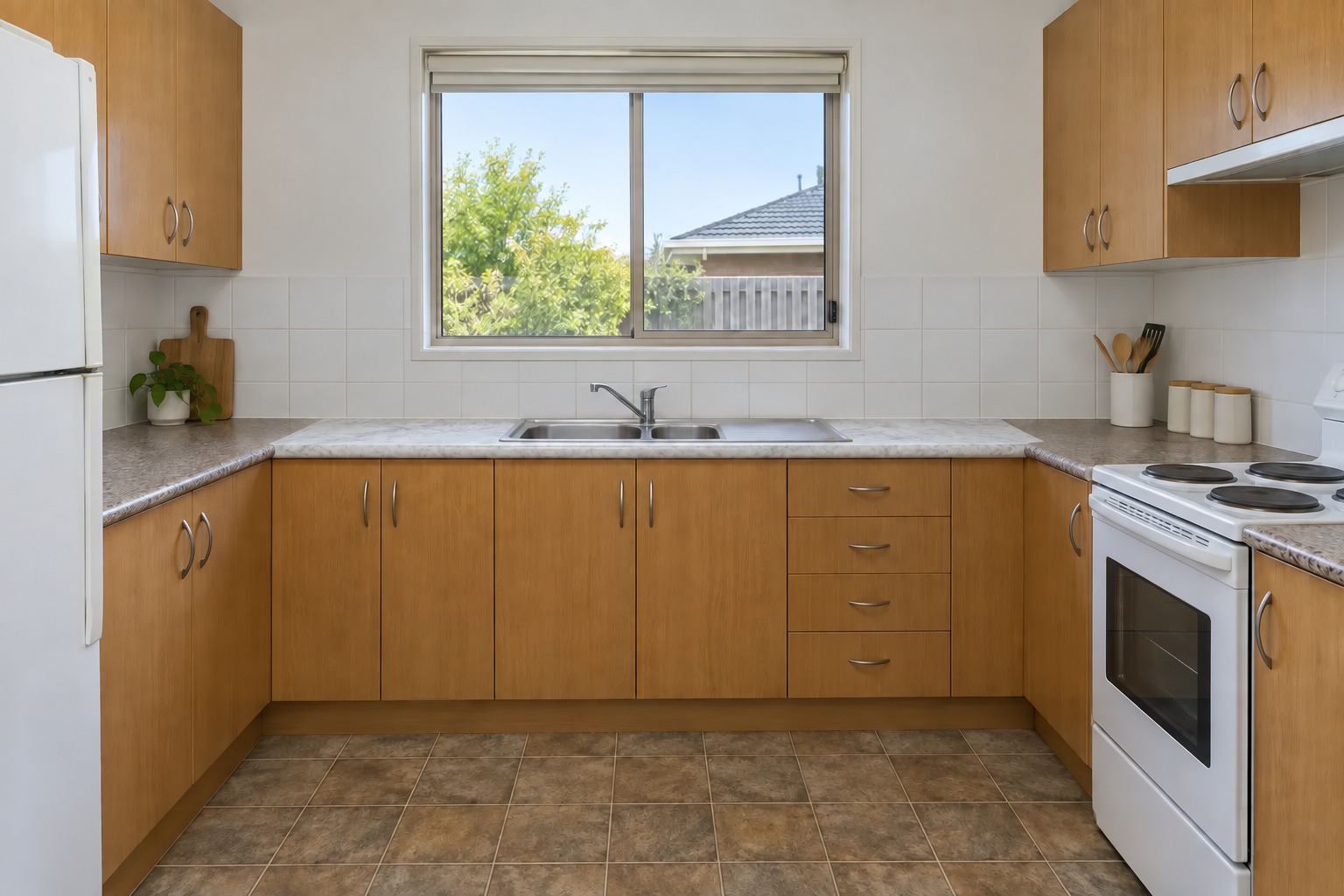 Sunburst kitchen edit: white marble on the back section with granite at both sides